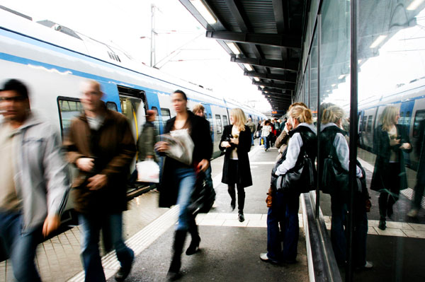 people getting off a train